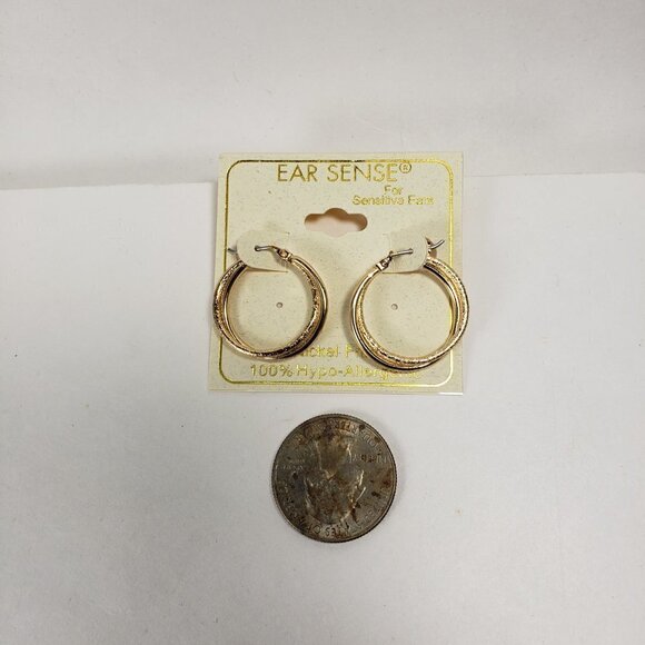 Stunning Intertwined Gold Tone Hoop Earrings with Textured and Polished Finish - Picture 6 of 6